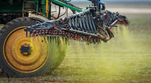 Herbicide is sprayed on a soybean field